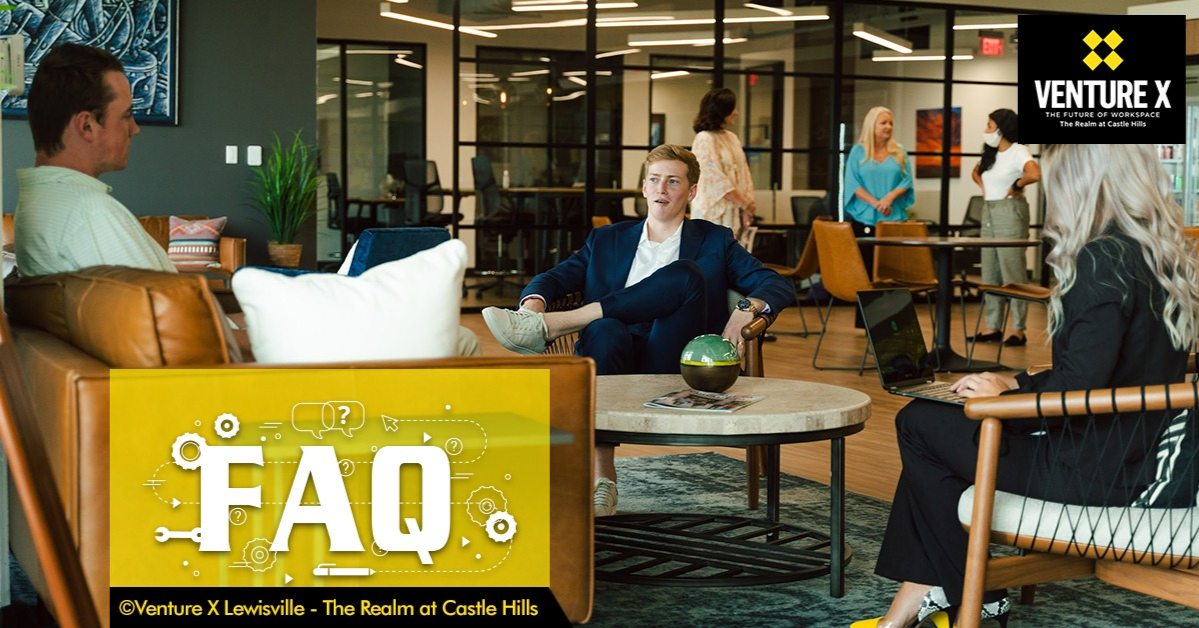 In a modern workspace, people engage in conversation while a sign reads "FAQ" for Venture X Lewisville - The Realm at Castle Hills. This flexible workspace is perfect for collaboration and creativity.