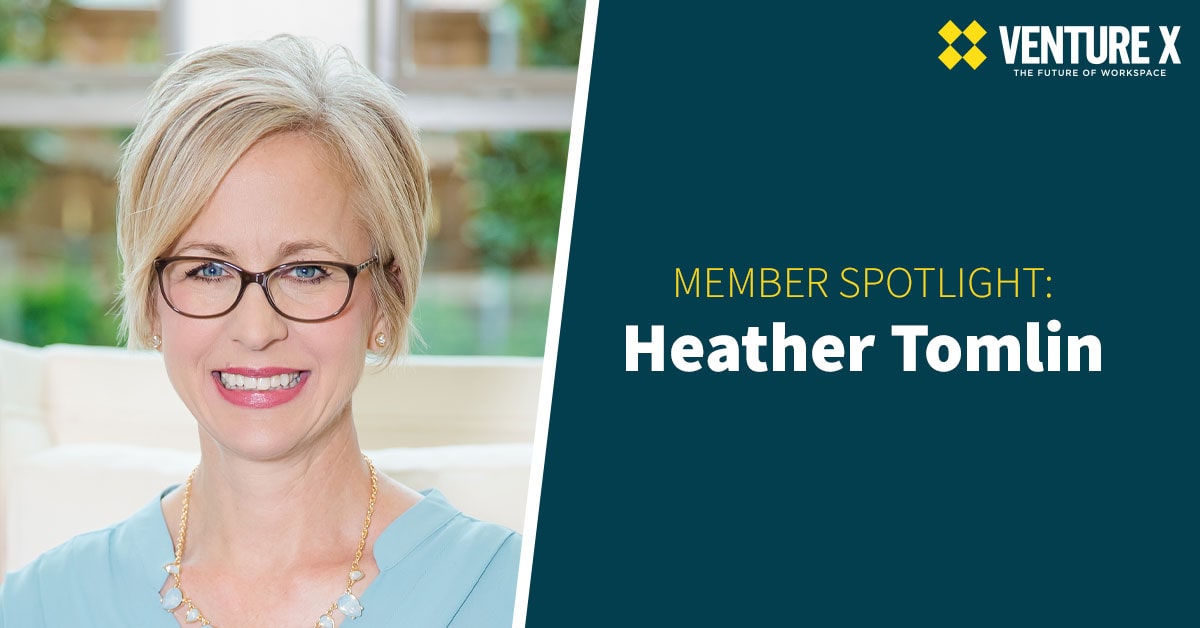 A person with short blonde hair and glasses is smiling, with text reading "Member Spotlight: Heather Tomlin - Venture X" on a teal background, celebrating her success in revolutionizing coworking space dynamics.