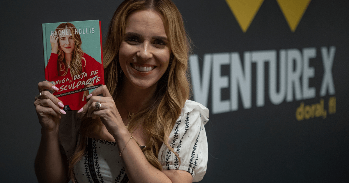 A person holds a book titled "Amiga