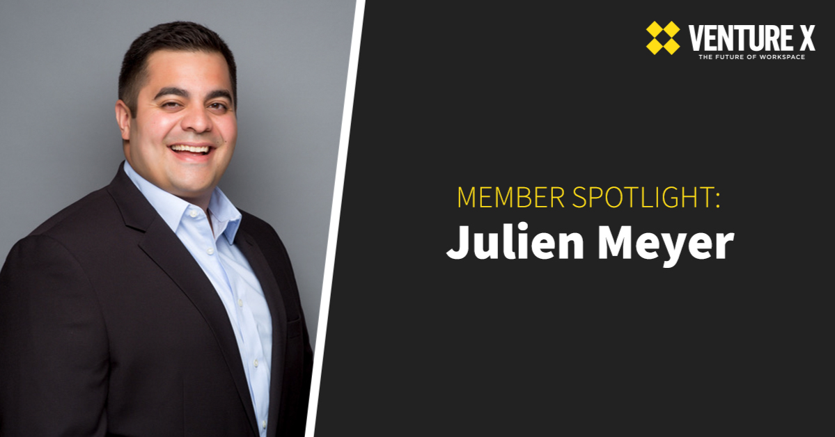 Smiling man in a dark suit against a gray background. Text reads "MEMBER SPOTLIGHT: Julien Meyer" with "VENTURE X" logo in the corner