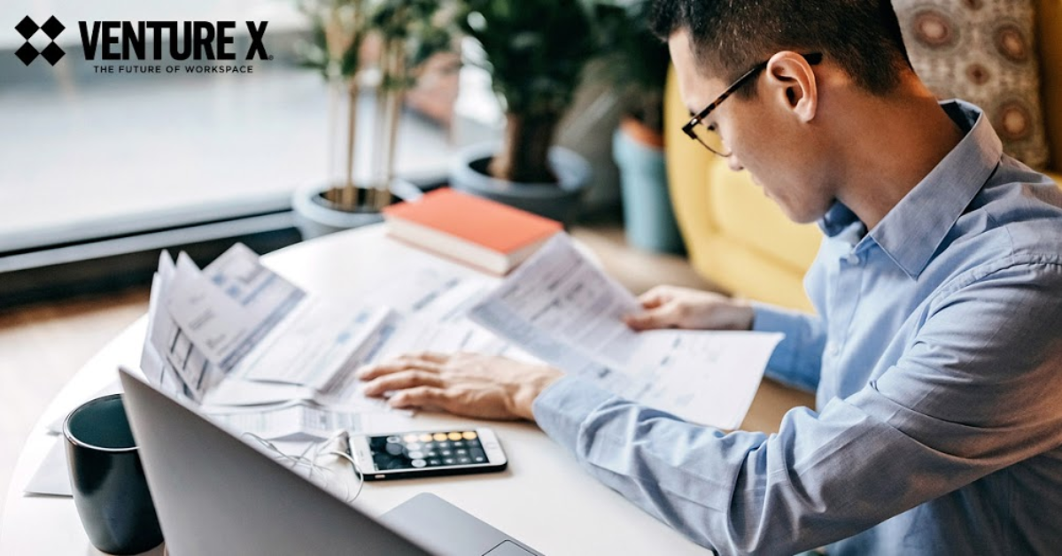 A person sits at a desk in their virtual office